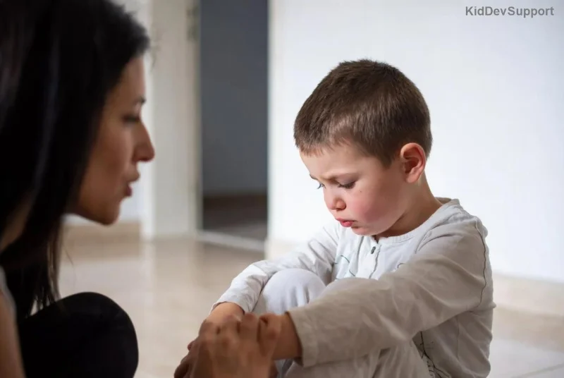 Child in early intervention therapy smiling