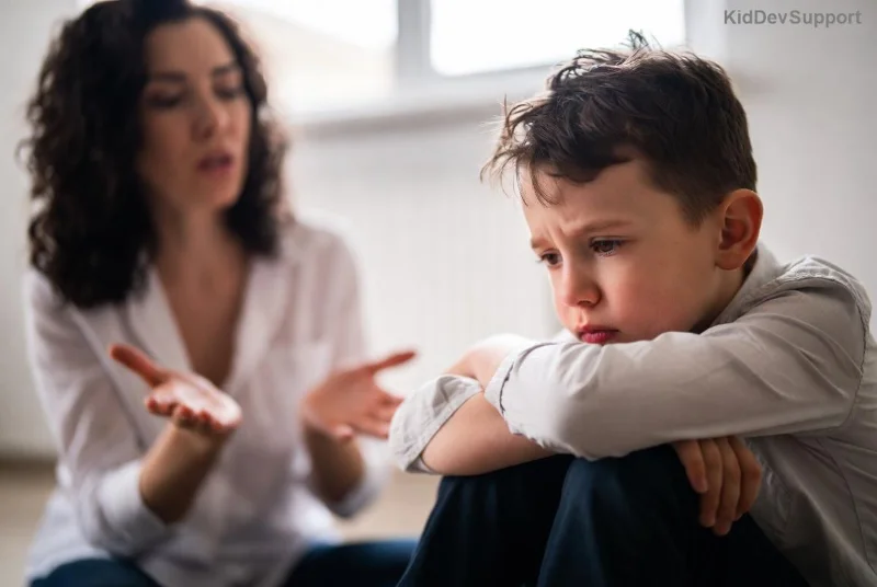 Peer mentor guiding a child with autism in educational activity