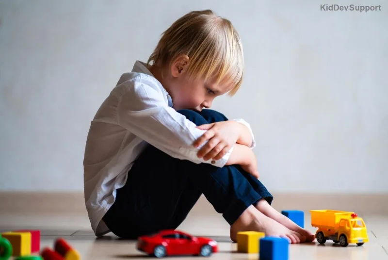 Happy autistic child playing with friends