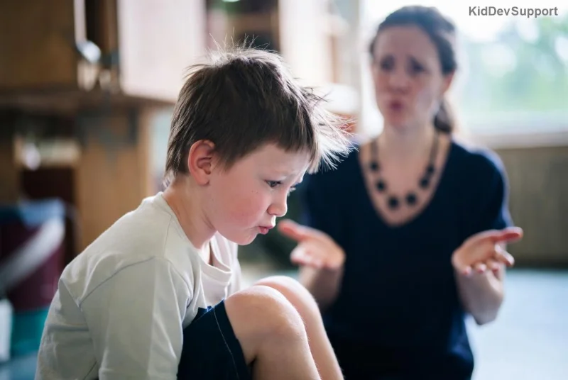 Person demonstrating hypermobile joints alongside autism awareness symbols