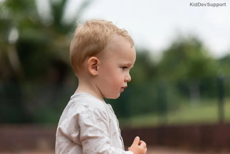 Happy child communicating successfully with AAC support