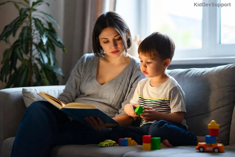 Children stacking colorful building blocks to learn prepositions
