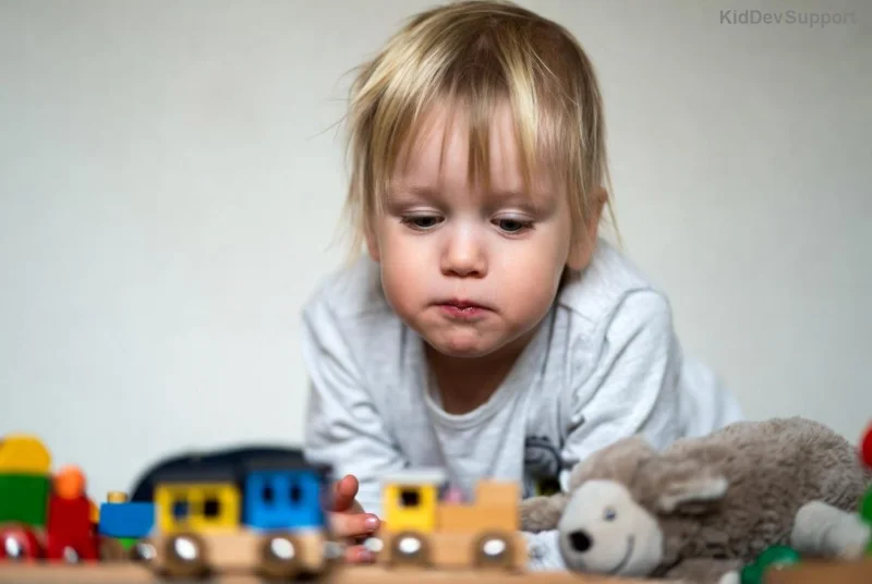 Child practicing speech in front of mirror